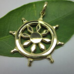 K22YG Dharma‐cakra Pendant